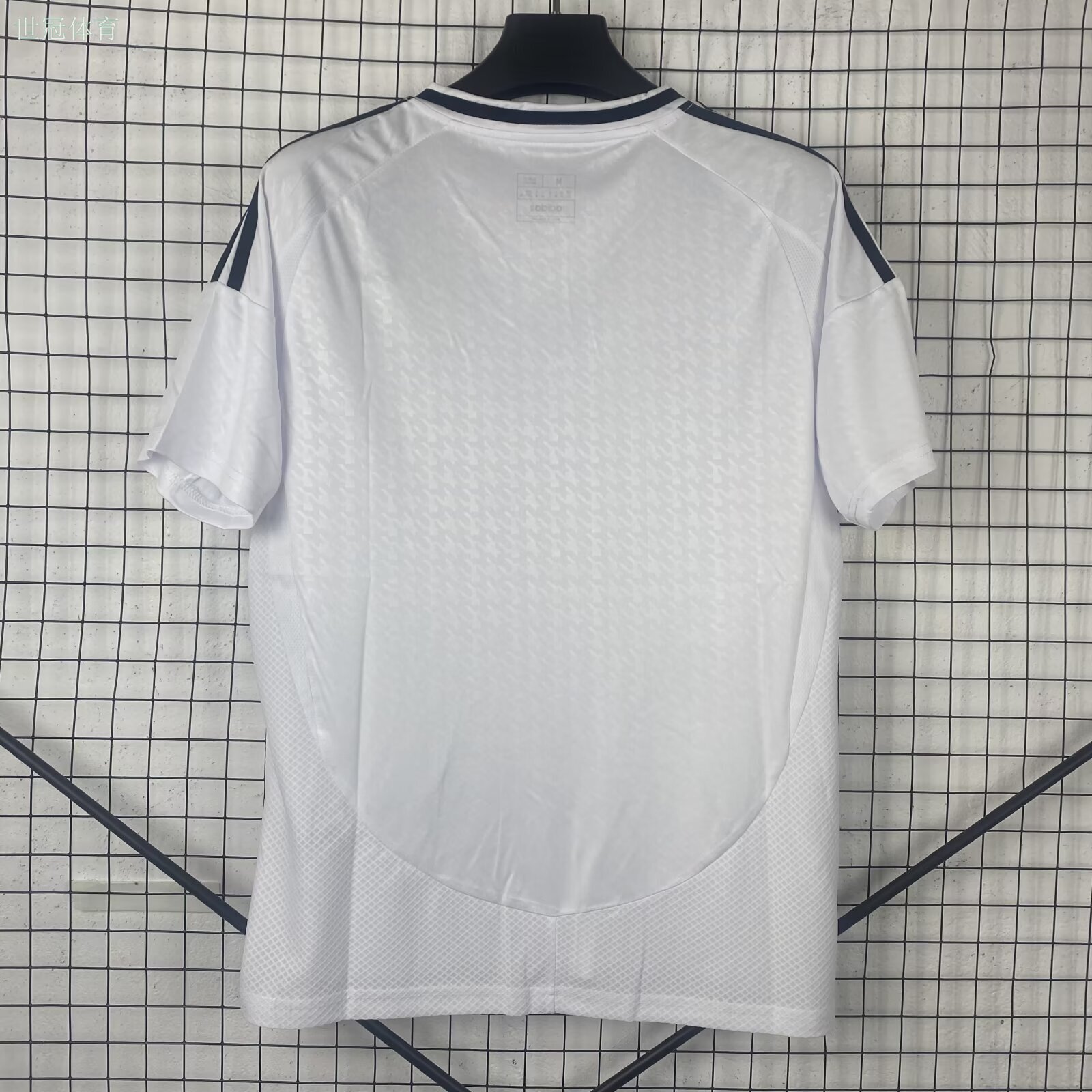24/25 Real Madrid Home Jersey - White with Navy Accents & Subtle Texture