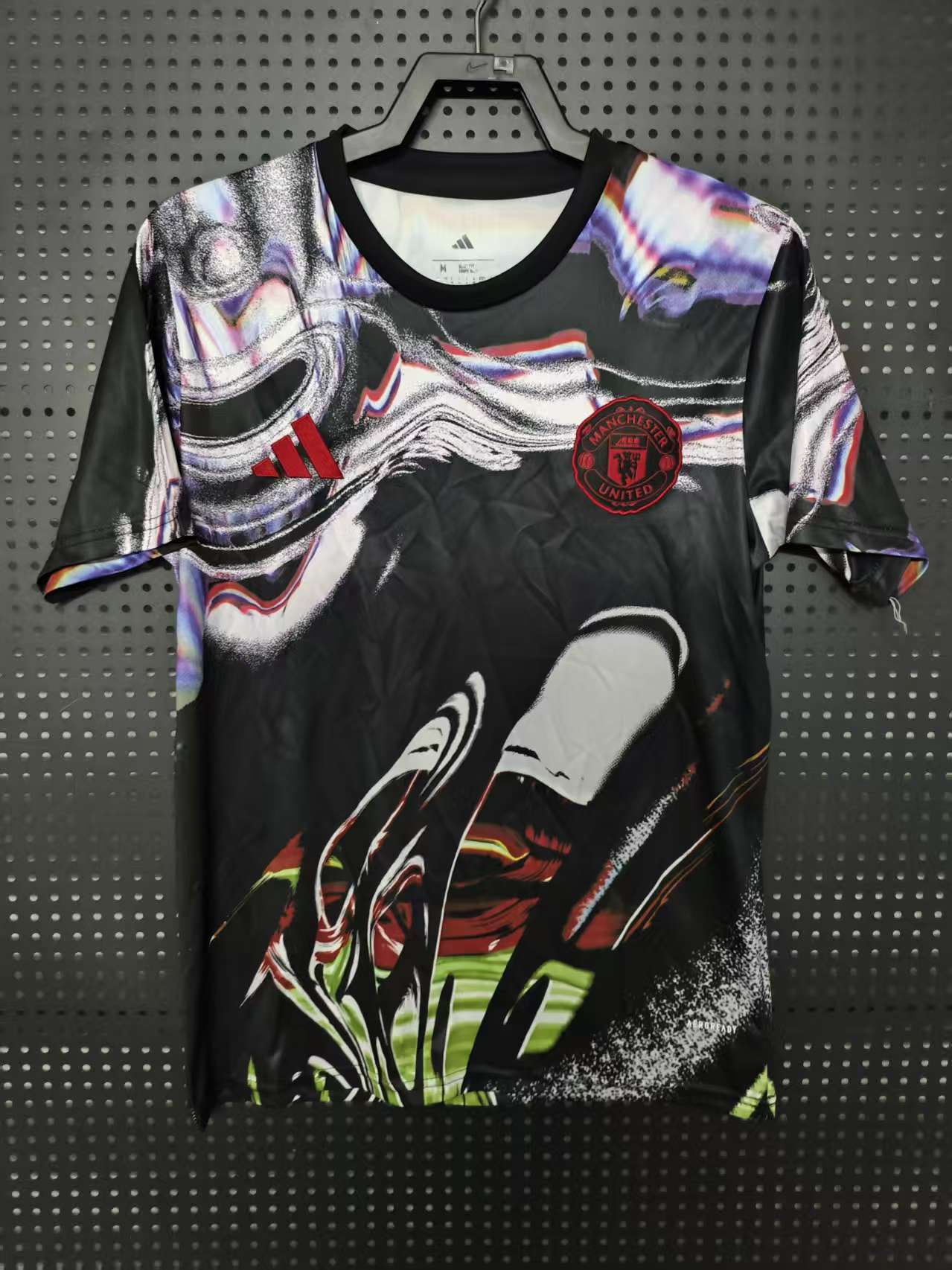 26/27 Manchester United Special Edition Jersey - Black with Vibrant Abstract Art Pattern & Red-White Accents