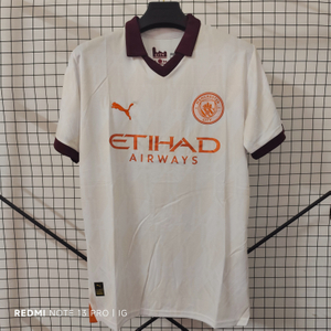 23/24 Manchester City Away Jersey - White with Burgundy-Orange Accents & Retro POLO Collar