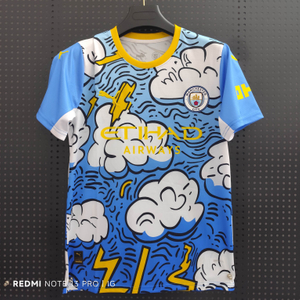 25/26 Manchester City Blue Lightning Cloud Special Jersey - Light Blue with Cartoon Clouds & Yellow Lightning Pattern