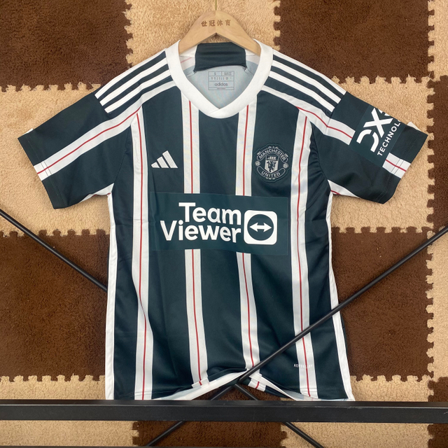 23/24 Manchester United Away Jersey - Dark Green with White-Red Vertical Stripes & Retro Shield Crest