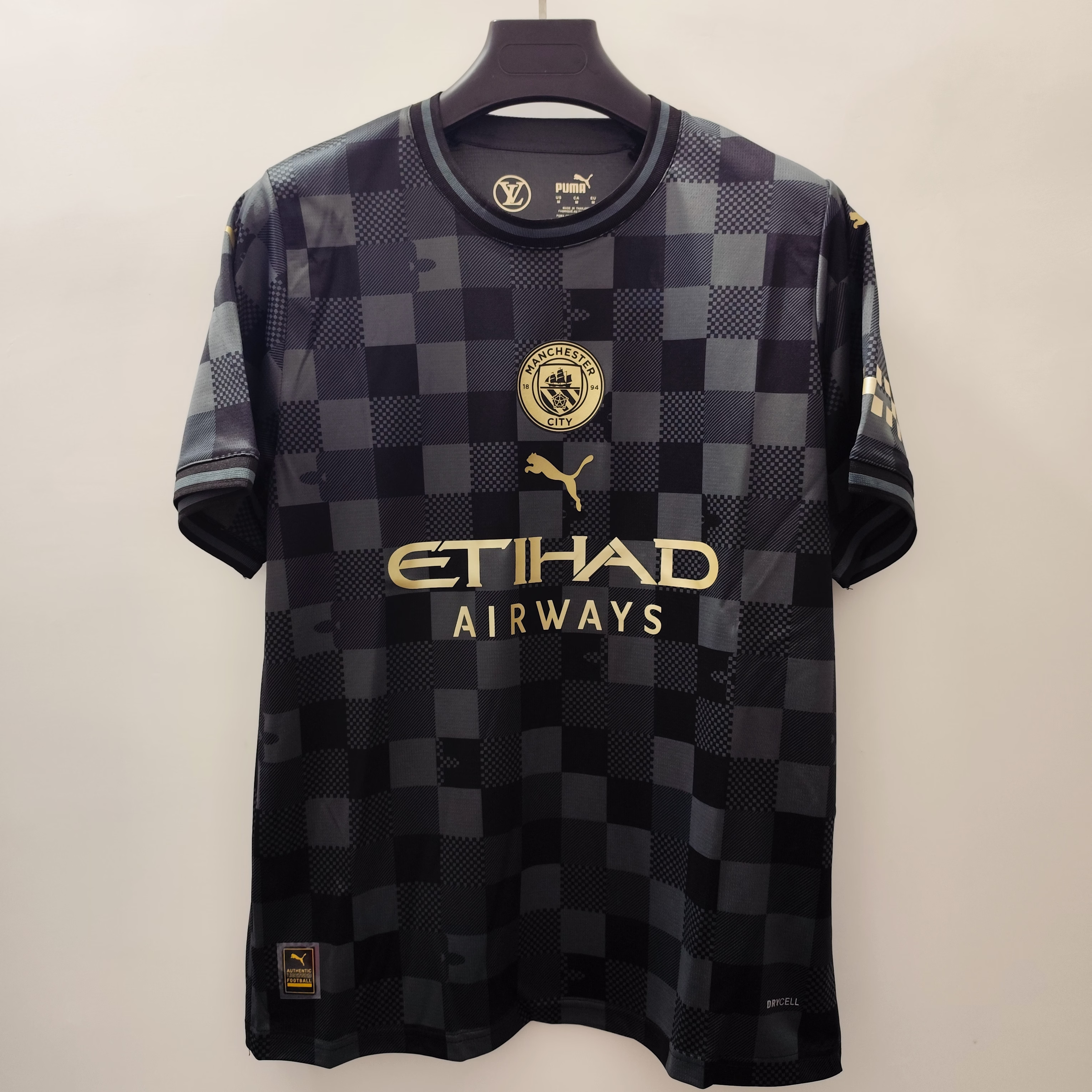 24/25 Manchester City 145th Anniversary Jersey - Black-Grey Checkerboard & Gold Accents (LV Collaboration)