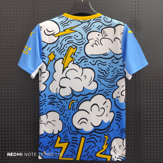 25/26 Manchester City Blue Lightning Cloud Special Jersey - Light Blue with Cartoon Clouds & Yellow Lightning Pattern