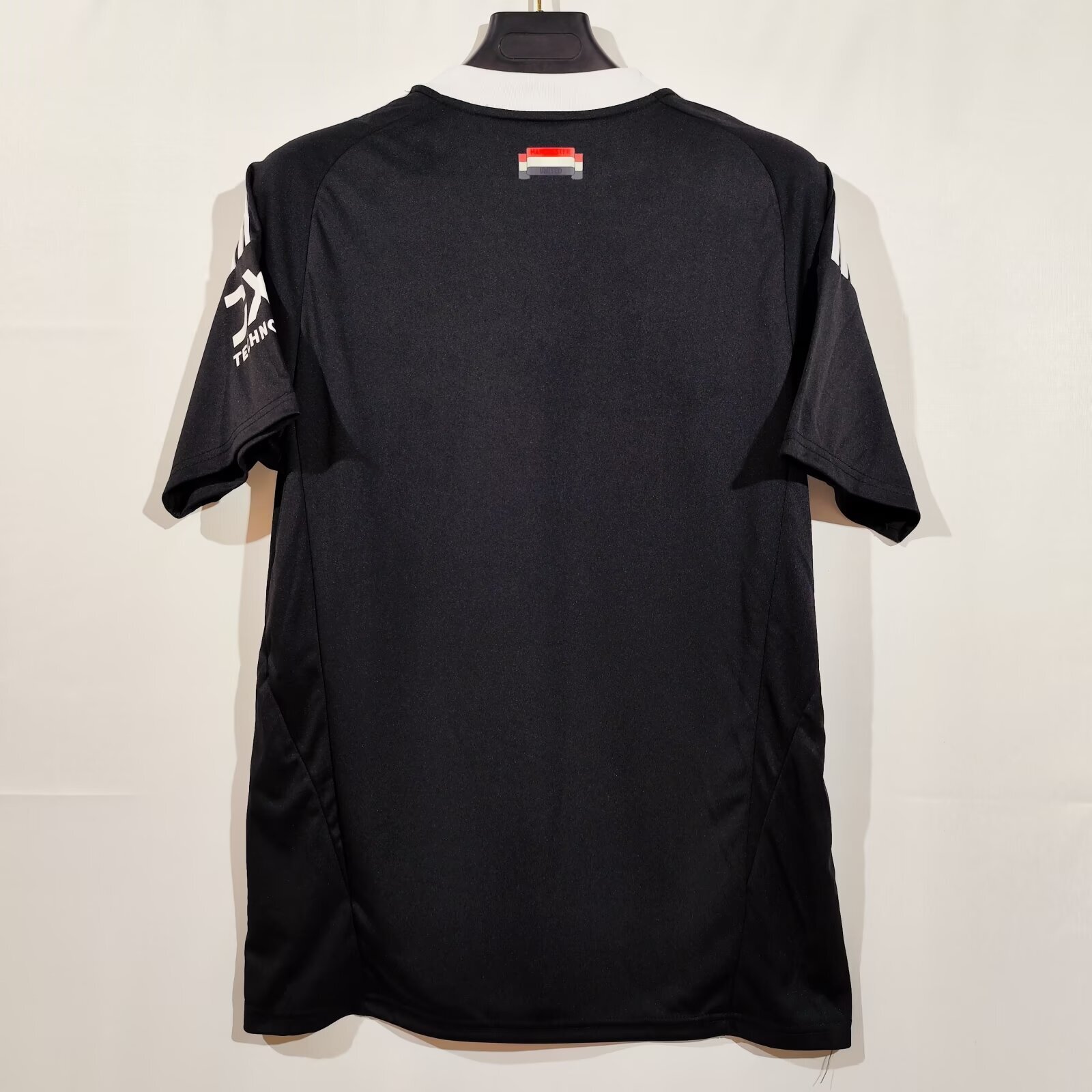 24/25 Manchester United Black Training Jersey - Black with White Retro Trefoil Logo & Minimalist Crest