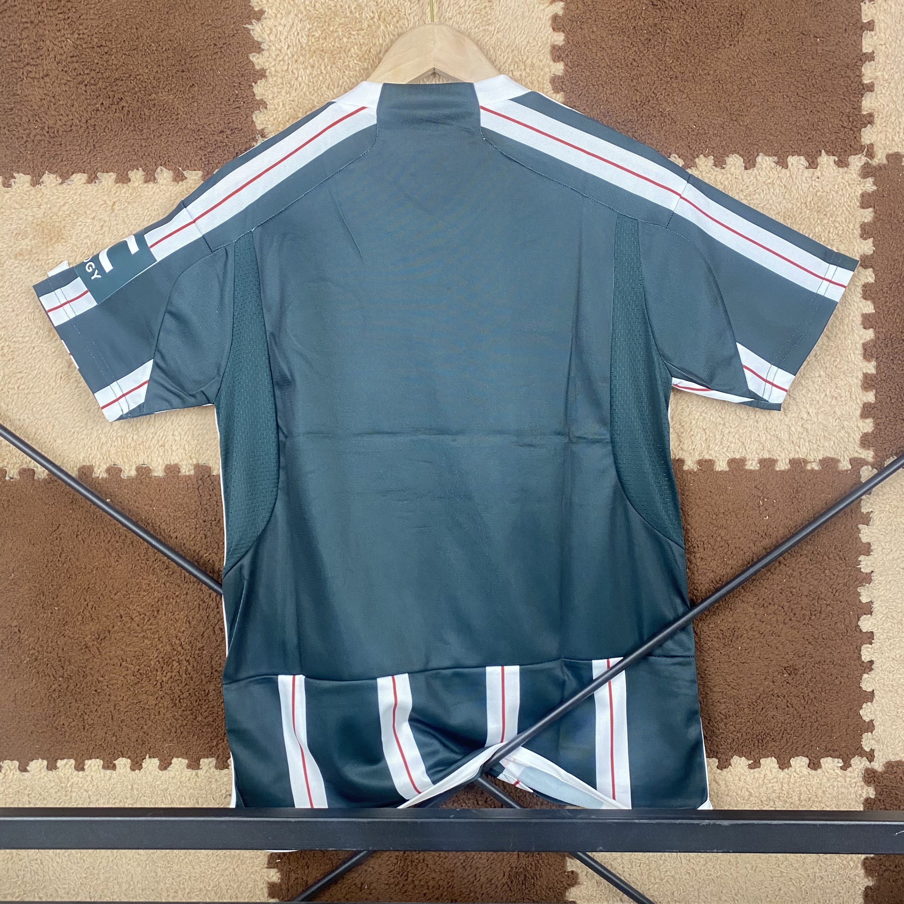 23/24 Manchester United Away Jersey - Dark Green with White-Red Vertical Stripes & Retro Shield Crest