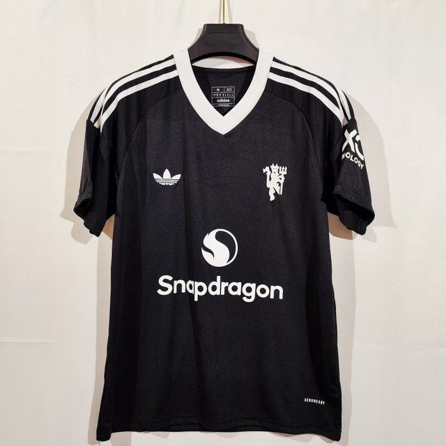 24/25 Manchester United Black Training Jersey - Black with White Retro Trefoil Logo & Minimalist Crest