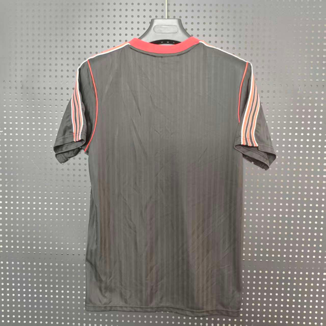  25/26 Manchester United Special Edition Black Jersey - Black with Red-Black Accents & Retro Trefoil Logo
