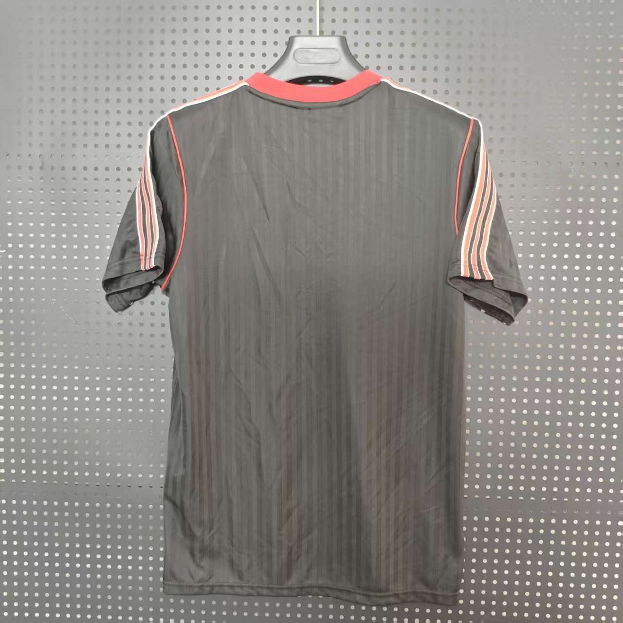  25/26 Manchester United Special Edition Black Jersey - Black with Red-Black Accents & Retro Trefoil Logo