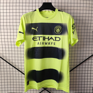22/23 Manchester City Third Away Jersey - Neon Yellow with Dark Stripes & Gradient Blur Design