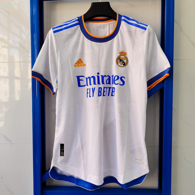 21/22 Real Madrid Home Jersey - White with Blue/Orange Accents & Spiral Pattern