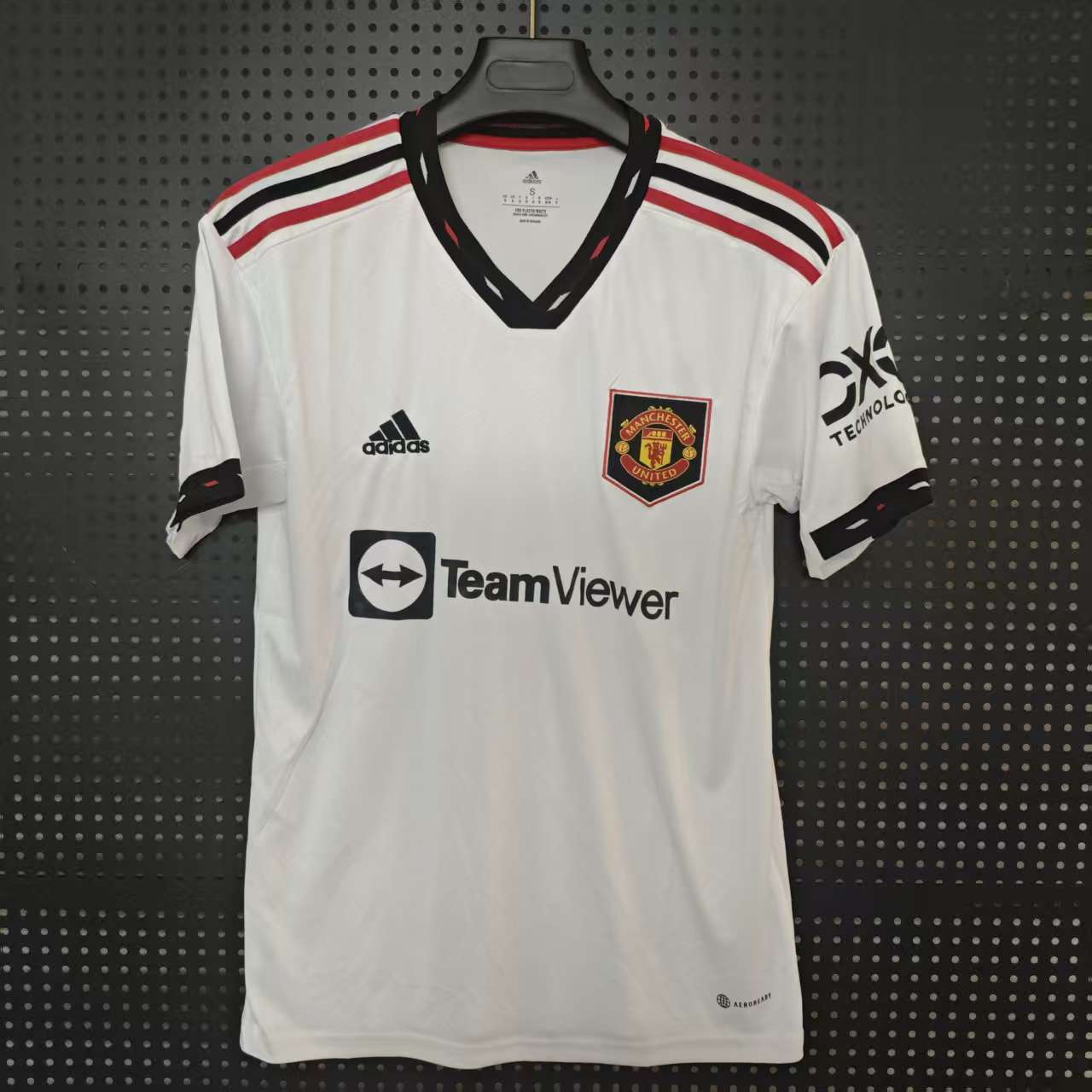 22/23 Manchester United Away Jersey - White with Black-Red Accents & Retro Shield Crest