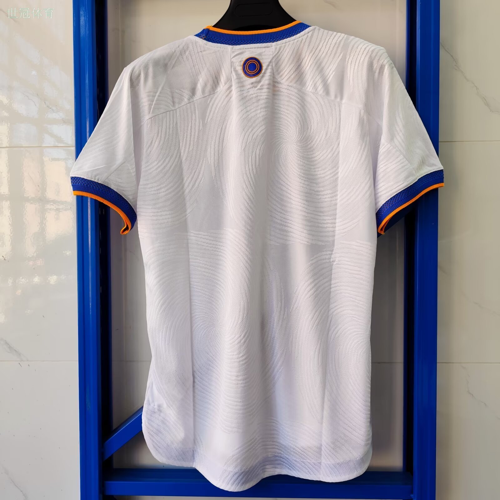 21/22 Real Madrid Home Jersey - White with Blue/Orange Accents & Spiral Pattern