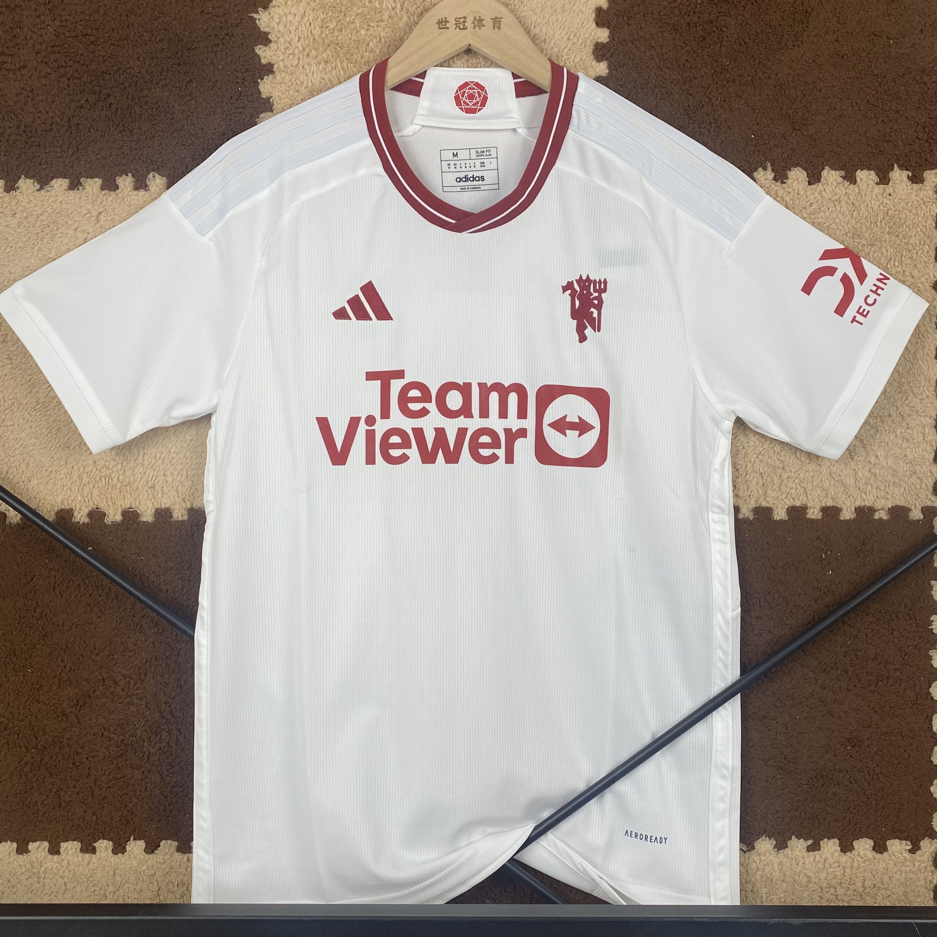 23/24 Manchester United Second Away Jersey - White with Burgundy Accents & Vertical Texture Fabric