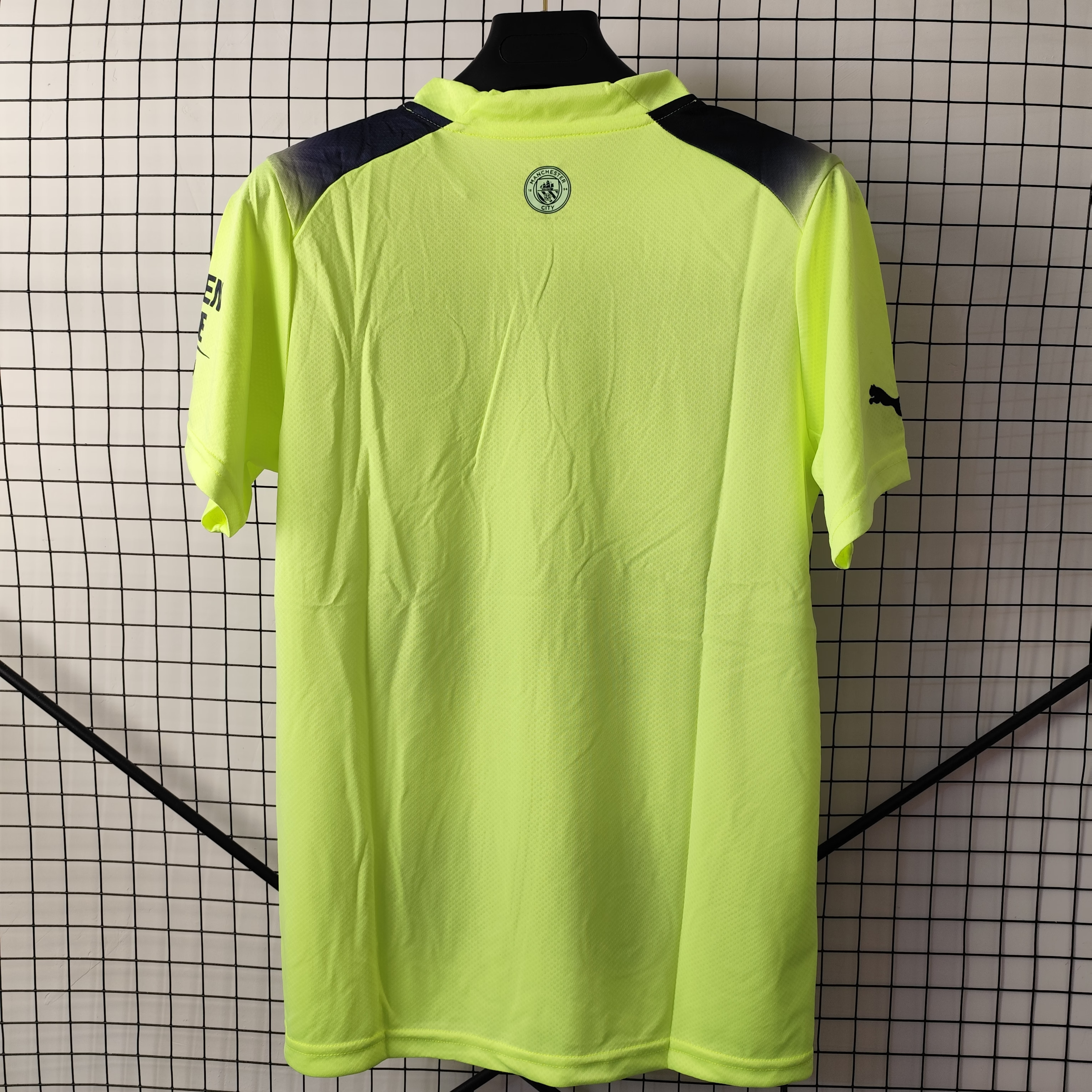 22/23 Manchester City Third Away Jersey - Neon Yellow with Dark Stripes & Gradient Blur Design