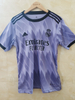 22/23 Real Madrid Away Jersey - Light Purple with Geometric Pattern & Black Accents