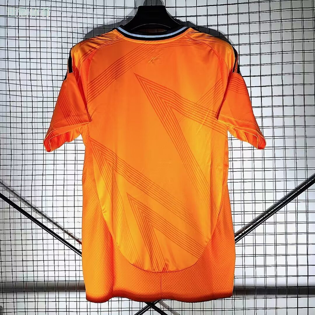 24/25 Real Madrid Away Jersey - Bright Orange with Dark Pattern & Navy Accents