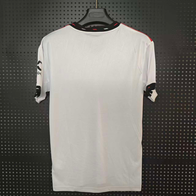 22/23 Manchester United Away Jersey - White with Black-Red Accents & Retro Shield Crest