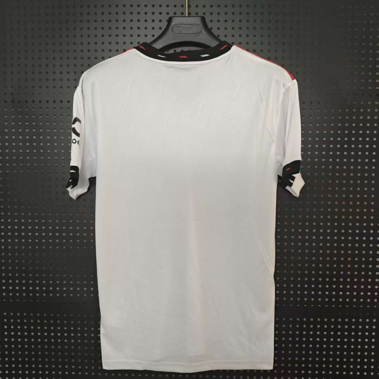 22/23 Manchester United Away Jersey - White with Black-Red Accents & Retro Shield Crest