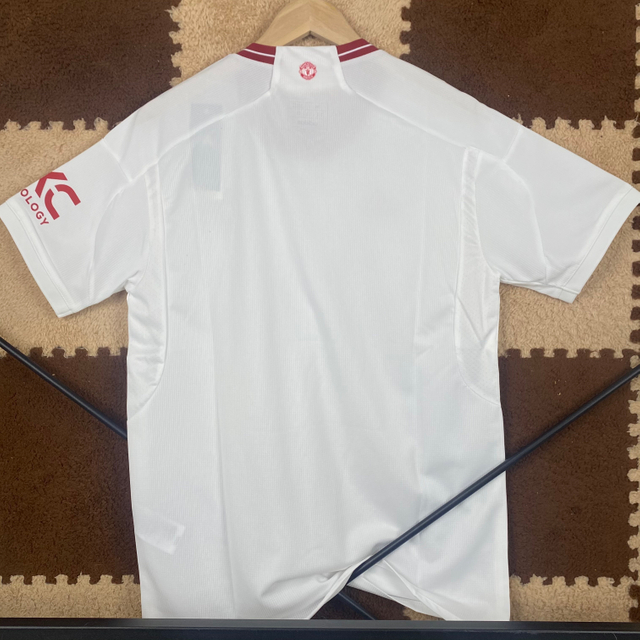 23/24 Manchester United Second Away Jersey - White with Burgundy Accents & Vertical Texture Fabric