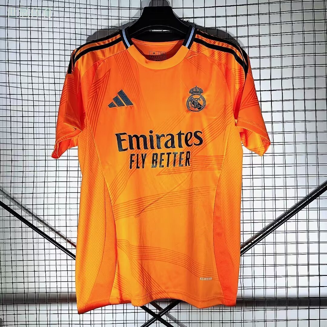 24/25 Real Madrid Away Jersey - Bright Orange with Dark Pattern & Navy Accents