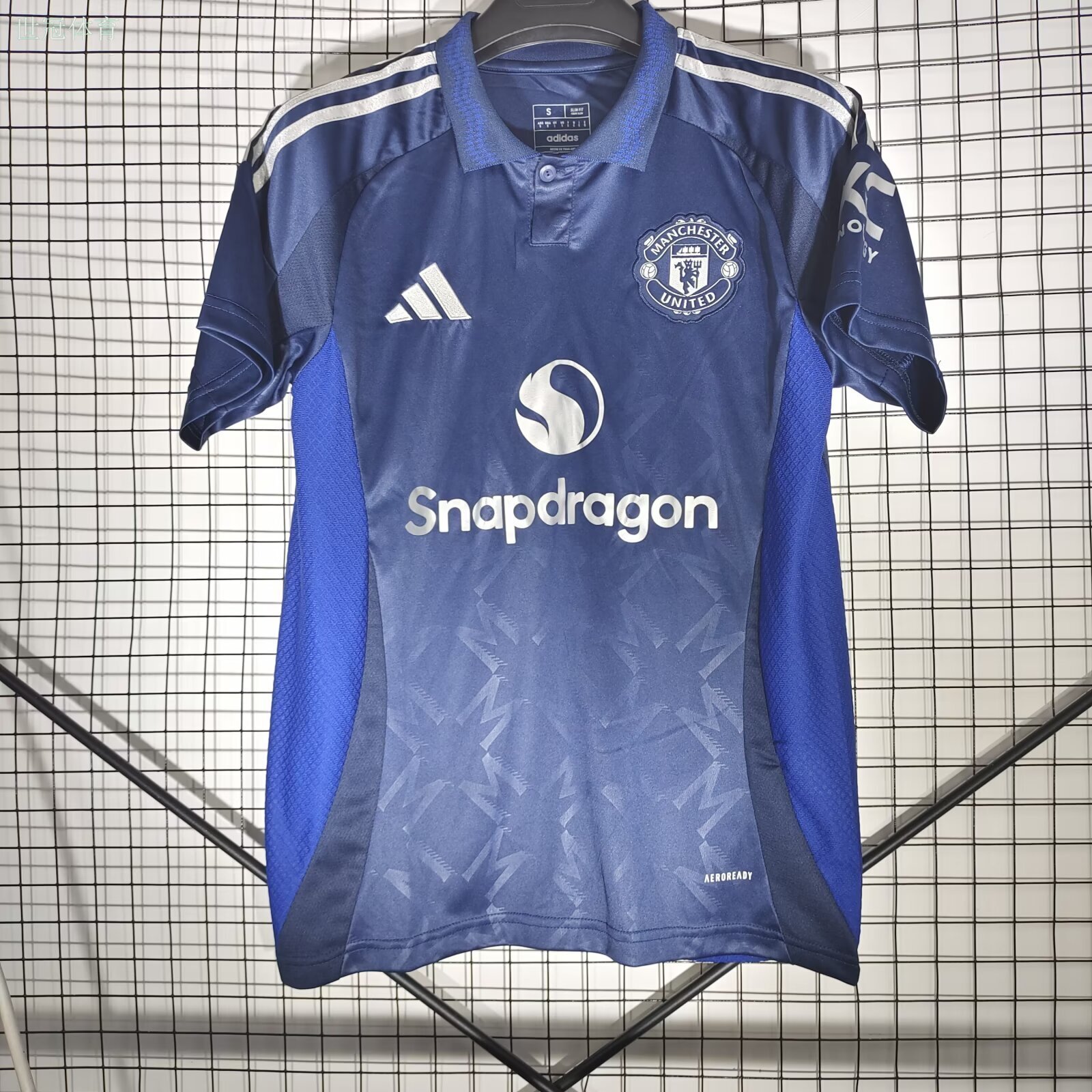 24/25 Manchester United Away Jersey - Blue Gradient with Geometric Texture & Polo Collar